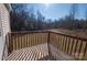 Wooden deck overlooking a wooded backyard at 461 Ret Stafford Ln, Taylorsville, NC 28681