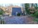 A-frame home exterior, gravel driveway, and seasonal foliage at 5212 Bay Rd, Rock Hill, SC 29732