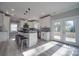 Open kitchen island with granite and white shaker cabinets at 604 Impala Dr, Albemarle, NC 28001