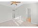 Bedroom with ceiling fan and access to closet and hallway at 6855 Juniper Tree St, Charlotte, NC 28215