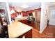 Modern kitchen with stainless steel appliances and breakfast bar at 808 E Main St, Maiden, NC 28650