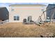 Large backyard with trampoline and playset at 9321 Bayview Pkwy, Charlotte, NC 28216