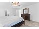 Main bedroom with wood flooring, large bed, and ceiling fan at 9321 Bayview Pkwy, Charlotte, NC 28216