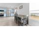 Dining area with gray table and chairs, near kitchen at 9321 Bayview Pkwy, Charlotte, NC 28216