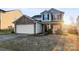 Two-story house with stone accents and a two-car garage at 9321 Bayview Pkwy, Charlotte, NC 28216
