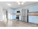 Kitchen with light blue cabinets and stainless steel appliances at 9321 Bayview Pkwy, Charlotte, NC 28216