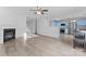 Living room with fireplace and laminate flooring at 9321 Bayview Pkwy, Charlotte, NC 28216