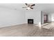 Spacious living room with fireplace and laminate flooring at 9321 Bayview Pkwy, Charlotte, NC 28216