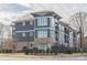 A well-maintained building showcases a brick foundation and modern design elements at 935 Mcalway Rd # 306, Charlotte, NC 28211