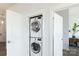 Conveniently located, this laundry area features a stacked washer and dryer at 935 Mcalway Rd # 306, Charlotte, NC 28211