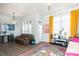Inviting living room with a chandelier, comfortable seating, and large windows that provide ample natural light at 935 Mcalway Rd # 306, Charlotte, NC 28211
