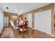 Bright dining room features a wood table with seating for four and built-in storage at 1032 Enderbury Dr, Indian Trail, NC 28079