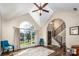 Bright living room with vaulted ceilings, large window, and hardwood floors at 112 Northhampton Dr, Mooresville, NC 28117