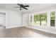 Bright living room featuring hardwood floors and large windows at 123 Lincoln St, Statesville, NC 28677