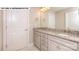 Double vanity bathroom with granite countertops at 193 Asmodean Ln, Troutman, NC 28166