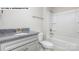 Bathroom includes a bathtub, toilet, and granite vanity at 193 Asmodean Ln, Troutman, NC 28166