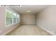 Bright bedroom with neutral walls and carpet flooring at 193 Asmodean Ln, Troutman, NC 28166