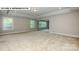 Large bedroom with multiple windows and carpet at 193 Asmodean Ln, Troutman, NC 28166