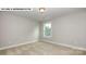 Well-lit bedroom with a single window and neutral walls at 193 Asmodean Ln, Troutman, NC 28166