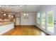 Bright breakfast nook with hardwood floors and access to patio at 193 Asmodean Ln, Troutman, NC 28166