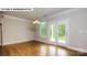 Breakfast nook with hardwood floors and french doors to backyard at 193 Asmodean Ln, Troutman, NC 28166