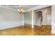 Formal dining room with hardwood floors and wainscoting at 193 Asmodean Ln, Troutman, NC 28166