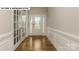 Elegant entryway showcasing hardwood floors and French doors at 193 Asmodean Ln, Troutman, NC 28166