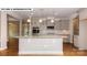 Kitchen island with granite countertop and pendant lighting at 193 Asmodean Ln, Troutman, NC 28166