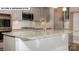 Kitchen island with granite countertop and sink at 193 Asmodean Ln, Troutman, NC 28166