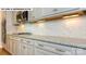 Modern kitchen with granite countertops and stainless steel appliances at 193 Asmodean Ln, Troutman, NC 28166
