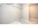 Laundry room with shelving and built-in storage at 193 Asmodean Ln, Troutman, NC 28166