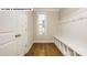 Convenient mudroom with built-in bench seating and hooks at 193 Asmodean Ln, Troutman, NC 28166