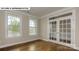 Bright office featuring hardwood floors and large windows at 193 Asmodean Ln, Troutman, NC 28166
