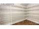 Walk-in pantry with ample shelving for storage at 193 Asmodean Ln, Troutman, NC 28166