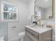 Modern bathroom with updated vanity, gold fixtures, and marble tile at 1940 33Rd Ne Ave, Hickory, NC 28601