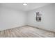 Bright bedroom with wood floors and a window at 1940 33Rd Ne Ave, Hickory, NC 28601