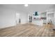 Modern kitchen with island, white cabinets, and blue appliances at 1940 33Rd Ne Ave, Hickory, NC 28601