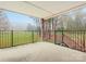 Private patio with black railing, overlooking grassy area at 1985 Lancer Ct, Gastonia, NC 28054