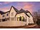 Exterior view of the home showcasing a modern design and brick facade at 207 Audrey Place Ln, Charlotte, NC 28226