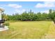 Large, well-maintained backyard with lush green grass and privacy fencing at 212 Portrait Way, Indian Trail, NC 28079