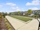 Enjoy a game of bocce ball on this well-maintained court in the community at 212 Portrait Way, Indian Trail, NC 28079