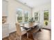 Charming breakfast nook with ample natural light and a view of the backyard at 212 Portrait Way, Indian Trail, NC 28079