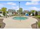 Community hot tub with houses in the background, surrounded by landscaping at 212 Portrait Way, Indian Trail, NC 28079