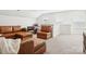 Upstairs living room with a large sectional sofa and a pool table for fun and relaxation at 212 Portrait Way, Indian Trail, NC 28079