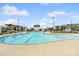 Large community pool with lounge chairs and cabanas for a relaxing summer day at 212 Portrait Way, Indian Trail, NC 28079