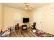 Functional bedroom with television, fan, chair, and window at 2485 Nc Highway 109 S Hwy, Mount Gilead, NC 27306