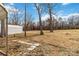 Large backyard with mature trees and open space at 307 E Old Highway 74 None, Monroe, NC 28112