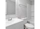 Clean bathroom with white vanity, toilet, and bathtub shower combo at 307 E Old Highway 74 None, Monroe, NC 28112