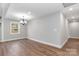 Dining room with hardwood floors and chandelier at 307 E Old Highway 74 None, Monroe, NC 28112