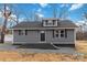 Newly built gray house with black shutters and a yard at 307 E Old Highway 74 None, Monroe, NC 28112